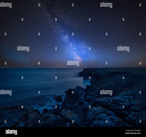 Stunning Vibrant Milky Way Composite Image Over Landscape Of St Govans