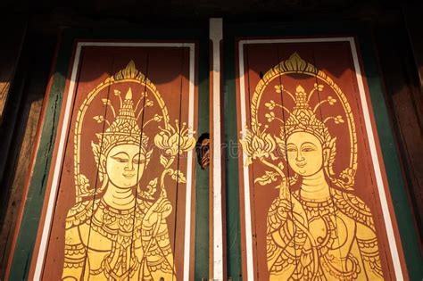 Golden And Red Thai Art Culture Door In The Temple With Sunlight Stock