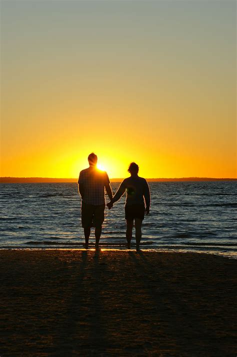 Couple Holding Hands Beach Golden Hour Sunset Holding Hands Love Marriage Pxfuel