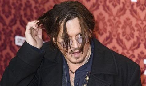 Johnny Depp Makes A Dishevelled Appearance At Mortdecai World Premiere