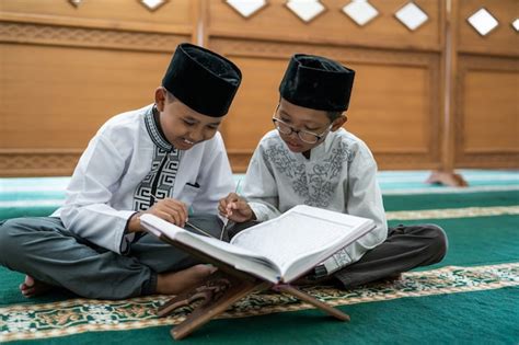 Premium Photo Muslim Kid Reading Quran