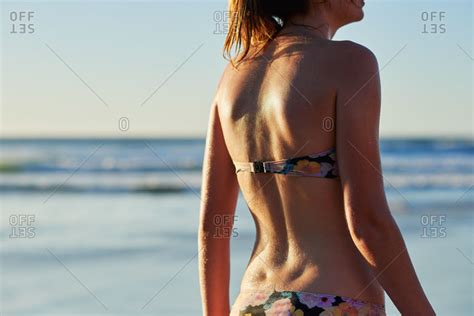 Girl In A Bikini Top To Bottom Of A View
