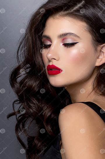closeup pportrait sensual beautiful woman make up curly hair style closeed eyes wear bra over