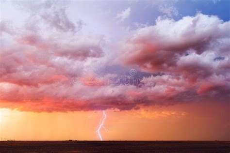 Dramatic Sunset Sky With Storm Clouds And Lightning Over The Arizona