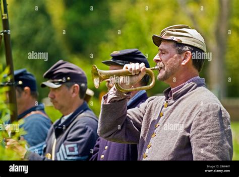 A Military Bugler Sounds The Call During A Civil War Reenactment At