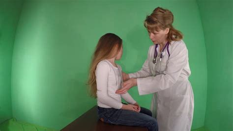 Stock Video Of Female Pediatrician Examining And Encouraging Young 14655385 Shutterstock