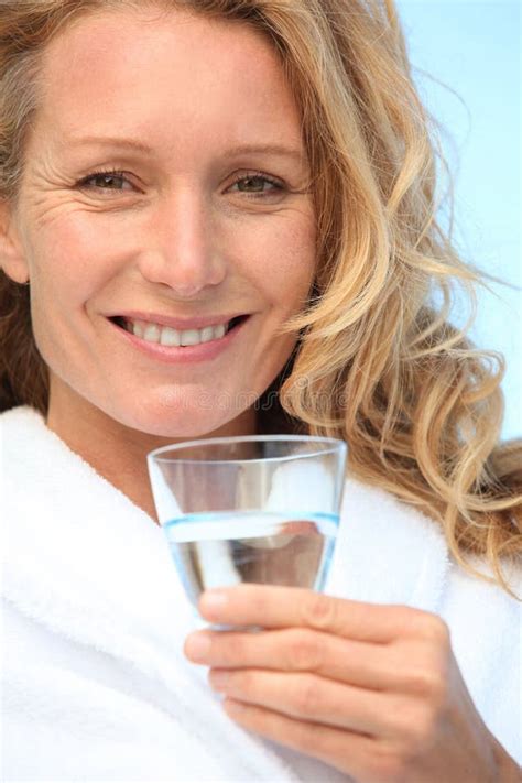 Smiling Woman With Water Glass At Spa Stock Photo Image Of Resting