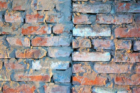 Old Red Brick Wall With Fissures Grunge Texture