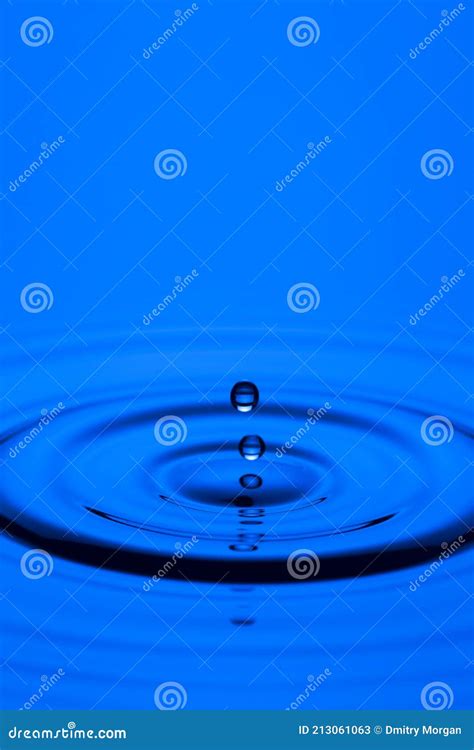 Macro Shot Of Abstract Blue Water Splashes Or Rain Drops Levitating