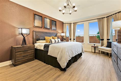 Sophisticated Master Bedroom With Bronze Accent Wall Bronze Bedroom