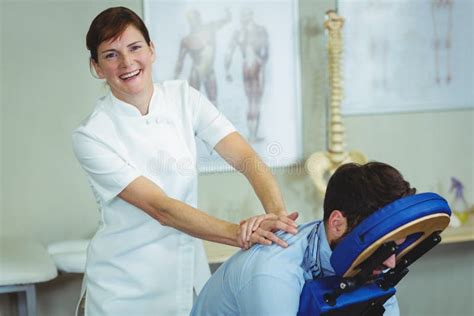 Physiotherapist Giving Back Massage To A Patient Stock Image Image Of Female Massaging 74516853