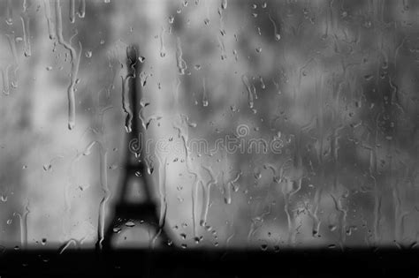 Eiffel Tower Seen Through Wet Window In Rain Storm Stock Photo Image