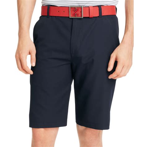 izod golf shorts solid flat front golf shorts in blue for men midnight lyst