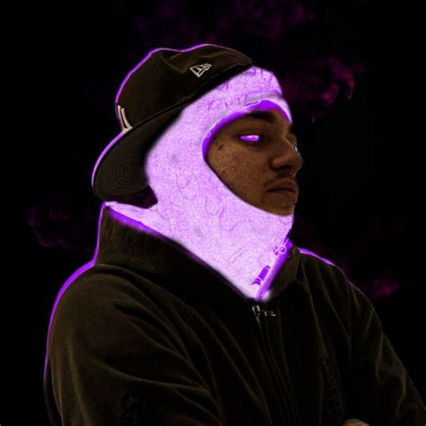 A Man In A Hoodie With Purple Light On His Face