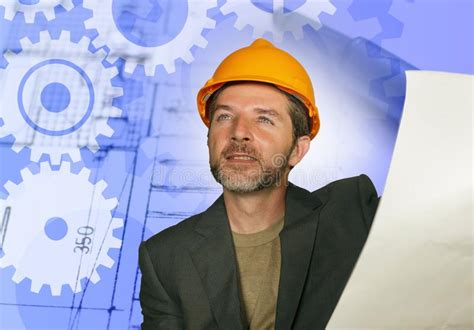 Confident Industrial Engineer Man in Builder Helmet Checking Building ...