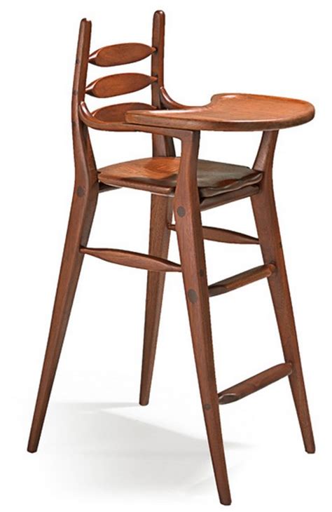 We love this high chair. From The Woodshop: Two Sweet, Custom High Chairs - Daddy Types