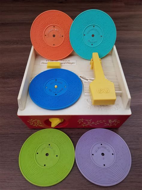 My 8 Month Old Sons Fisher Price Turntable Anyone Had One Of These