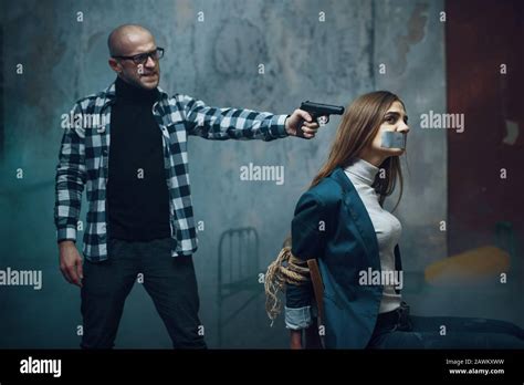 Maniac Kidnapper Puts A Gun To His Victims Head Stock Photo Alamy