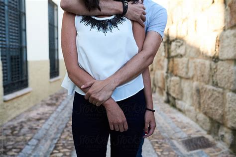 Hugging Couple In The Street Del Colaborador De Stocksy Guille