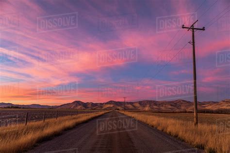 Rural Road At Sunset Stock Photo Dissolve