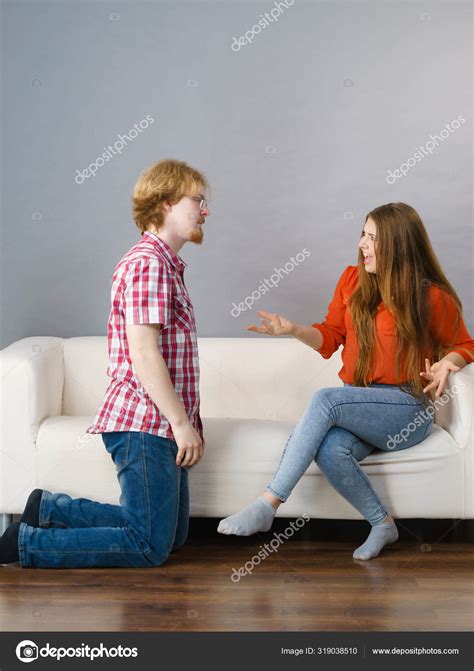 Man Begging For Forgiveness His Woman — Stock Photo © Voyagerix 319038510