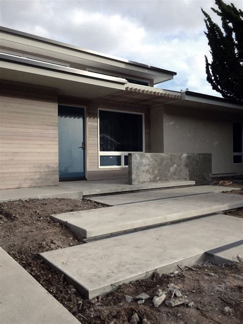 Staggered Concrete Pads Mid Century Modern Addition Construction
