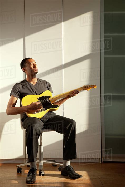Black Man Playing Guitar Stock Photo Dissolve