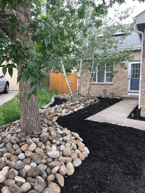 Rock River With Black Mulch River Rock Landscaping Mulch Landscaping