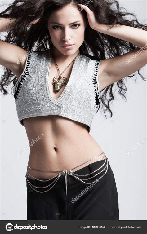 Attractive Fashion Girl In Embroidered Top Studio Stock Photo