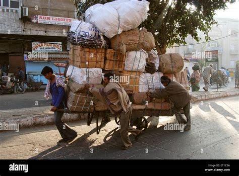 Worker Carrying Heavy Load Hi Res Stock Photography And Images Alamy