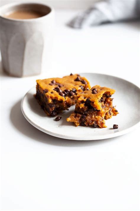 These Cakey Vegan Pumpkin Chocolate Chip Blondies Are A Hybrid Of
