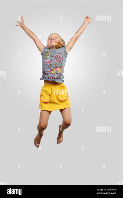 Happy Kid Jumping Stock Photo Alamy