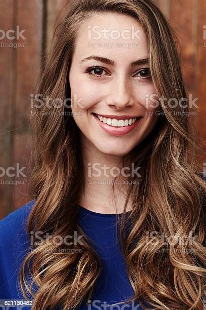 Beautiful Brown Eyed Girl Smiling At Camera Stock Photo Download