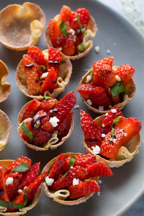 These Strawberry Balsamic Bites With Feta And Basil Are Served In