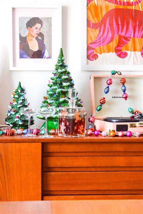 The tiny, multicolored bulbs at the end of the bran will give a. Ceramic Christmas Tree Sideboard Display | Ceramic ...