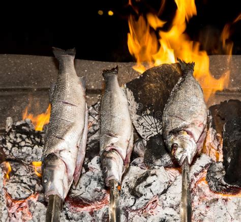 Cooking Fish Grilled Over Hot Coals Bonfire Stock Photo Image Of