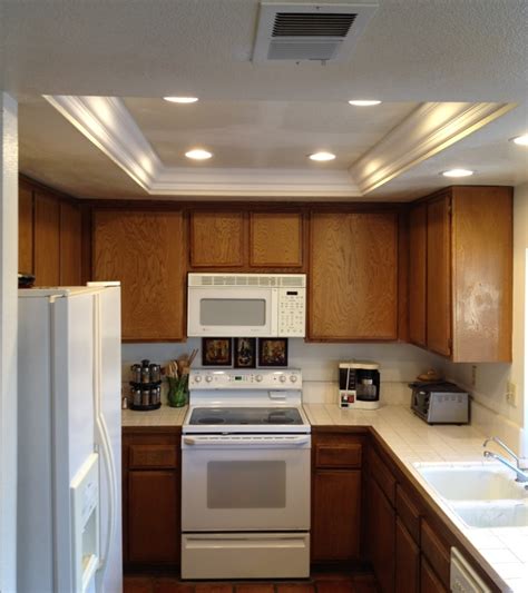This simple kitchen lighting idea is perfect for your. Kitchen Soffit Lighting with Recessed Lights | The ...