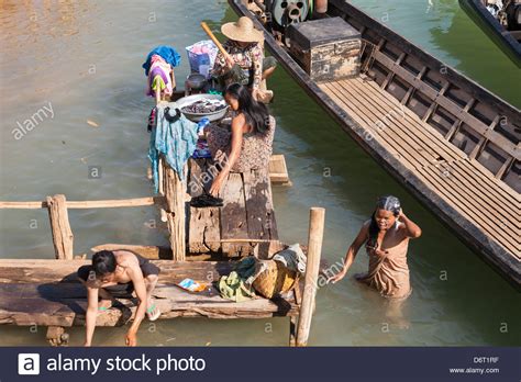 Women Washing Themselves In Inle Lake Near Indein Village Shan State