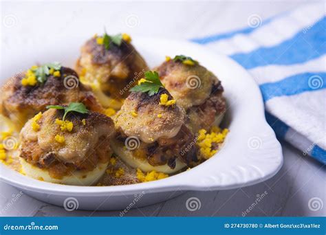 Eggs Stuffed With Tuna With Béchamel Au Gratin In The Oven Stock Photo
