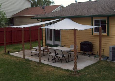 Colorful chairs under a diy canopy. Good Design Canvas Patio Covers in 2020 | Patio shade ...