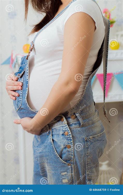 Belly Of A Pregnant Woman In A Denim Overalls Stock Image Image Of Ethnicity Abdomen