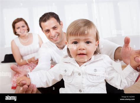 Proud Parents With Their Baby Stock Photo Alamy