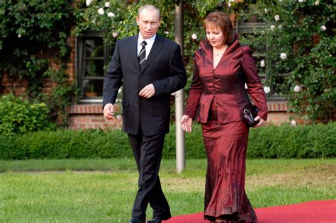 Photos Of Vladimir Putin And His Wife Looking Miserable Together
