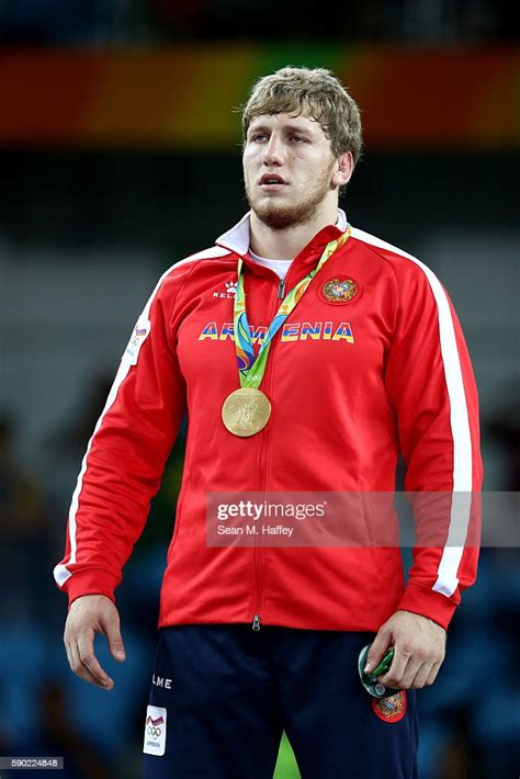 Artur Aleksanyan Of Armenia Poses With The Gold Medal For The Mens
