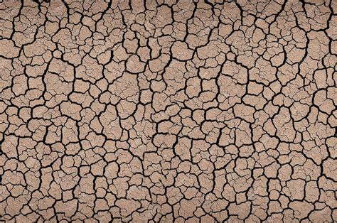 Premium Ai Image Background Dry Cracked Soil Texture