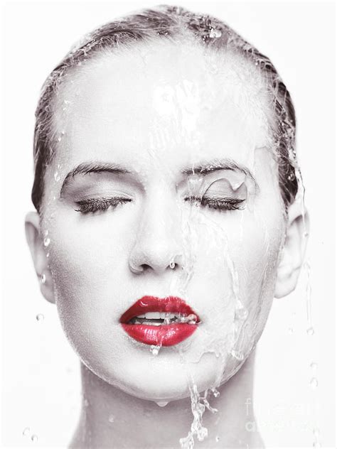 Artistic Portrait Of Woman With Water Running Over Her Face Photograph