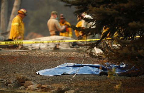 grim search for more fire victims 31 dead across california