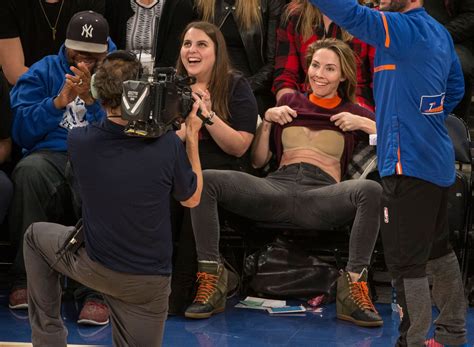 whitney cummings flashes the crowd sitting courtside at knicks game