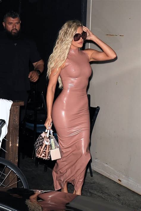 Khloe Kardashian Shows Off Her Curves In A Skintight Latex Dress While