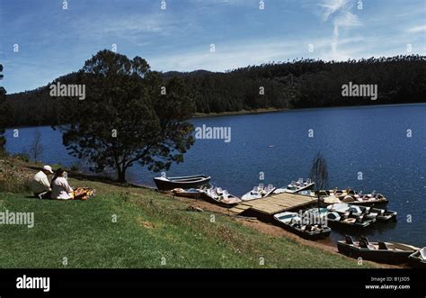 Tourists Sitting At The Lakeside Pykara Lake Nilgiris Tamil Nadu